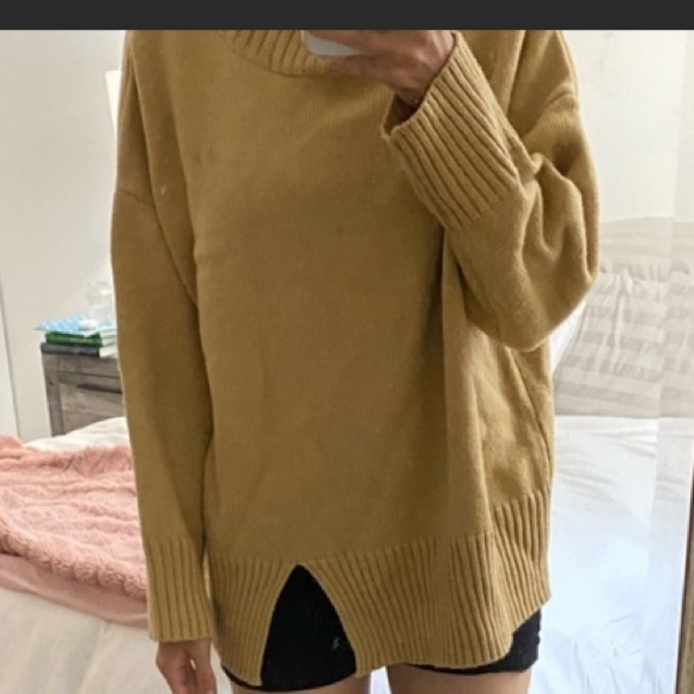 Neutral turtleneck sweater